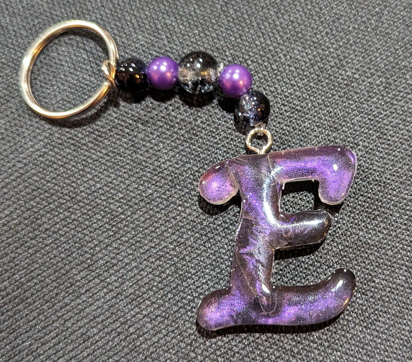 E letter purple beaded keychain