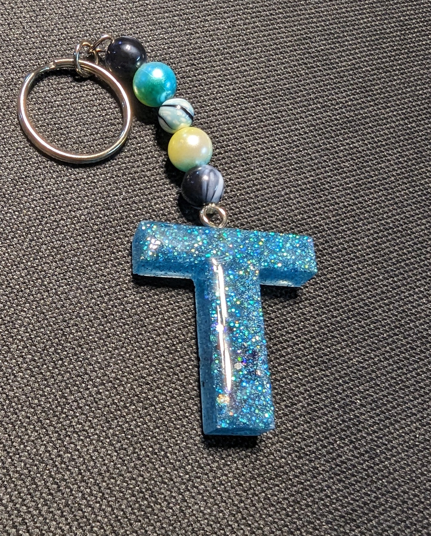 T letter blue beaded keychain