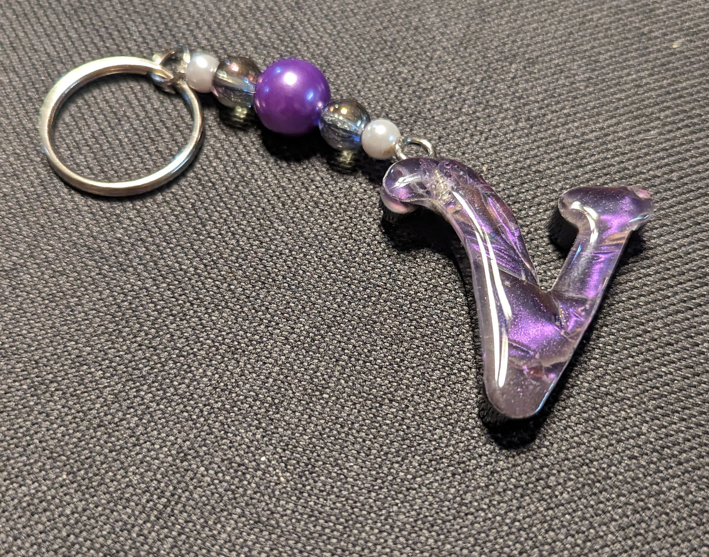 V letter purple beaded keychain