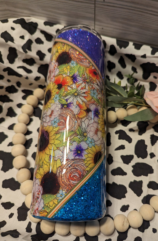 30 oz flowers with blue and purple background epoxy tumbler