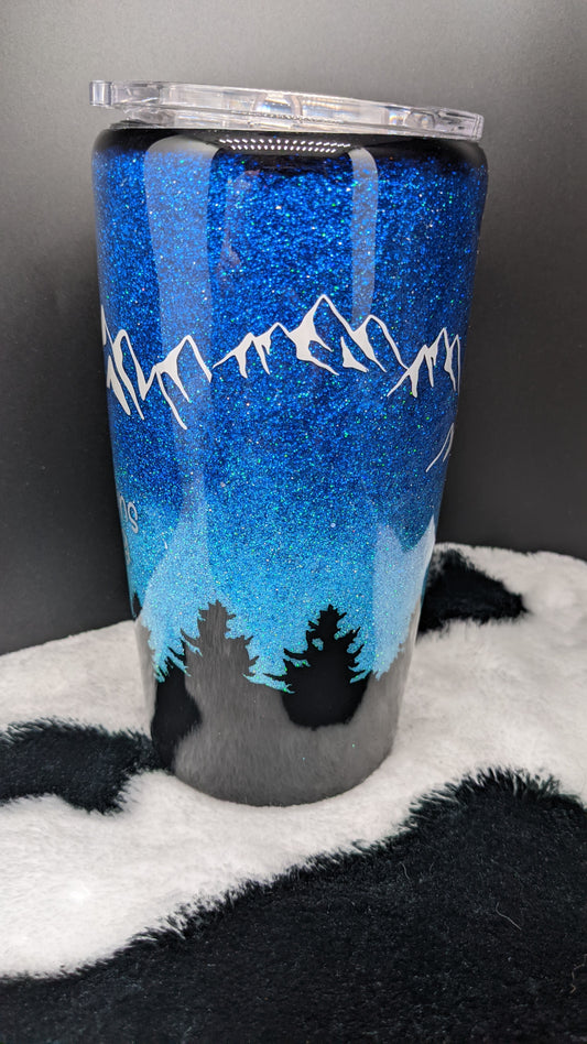 20 oz custom the mountains are calling blue epoxy tumber