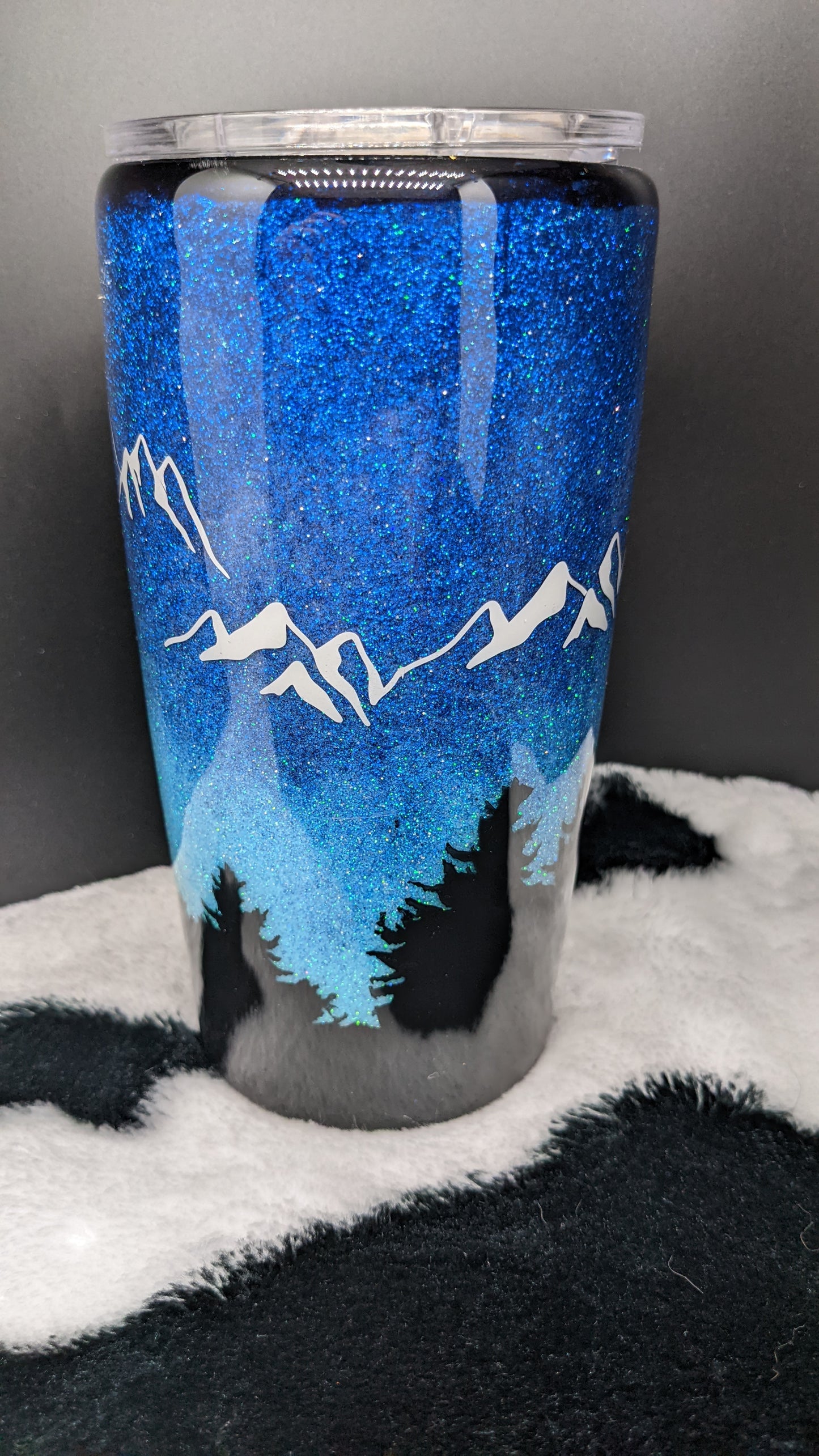 20 oz custom the mountains are calling blue epoxy tumber