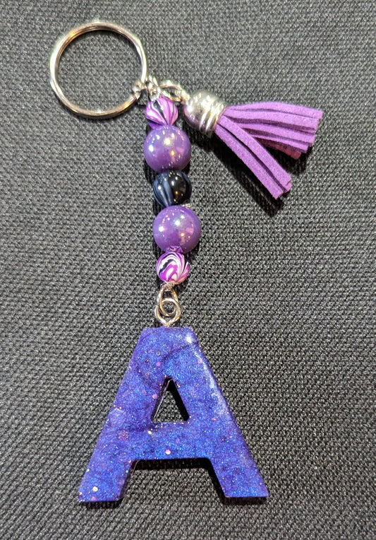 A letter Blueish purple beaded keychain