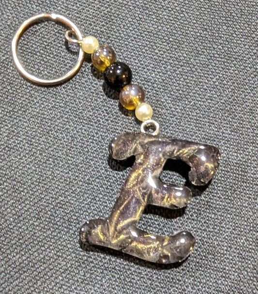 E letter gold beaded keychain