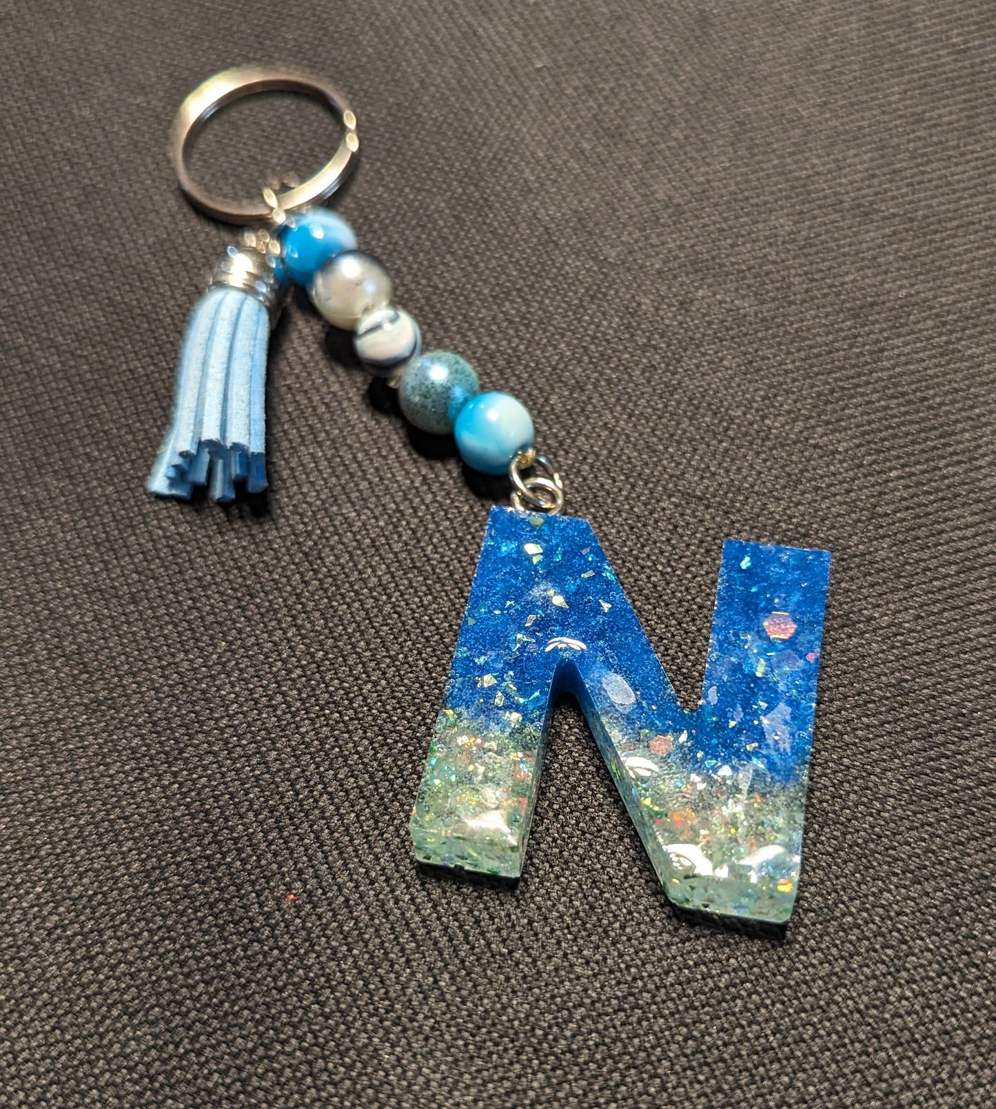 N letter blue and green beaded keychain