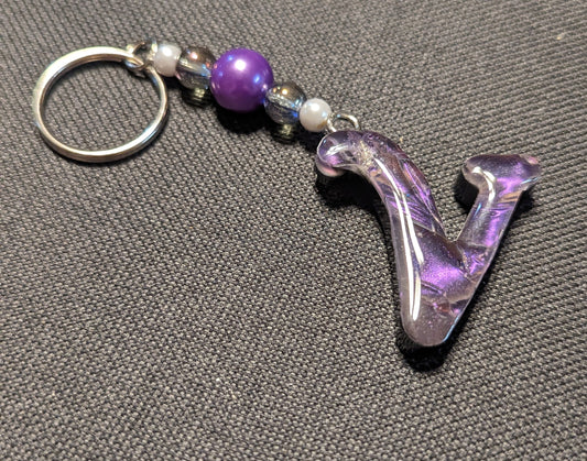 V letter purple beaded keychain
