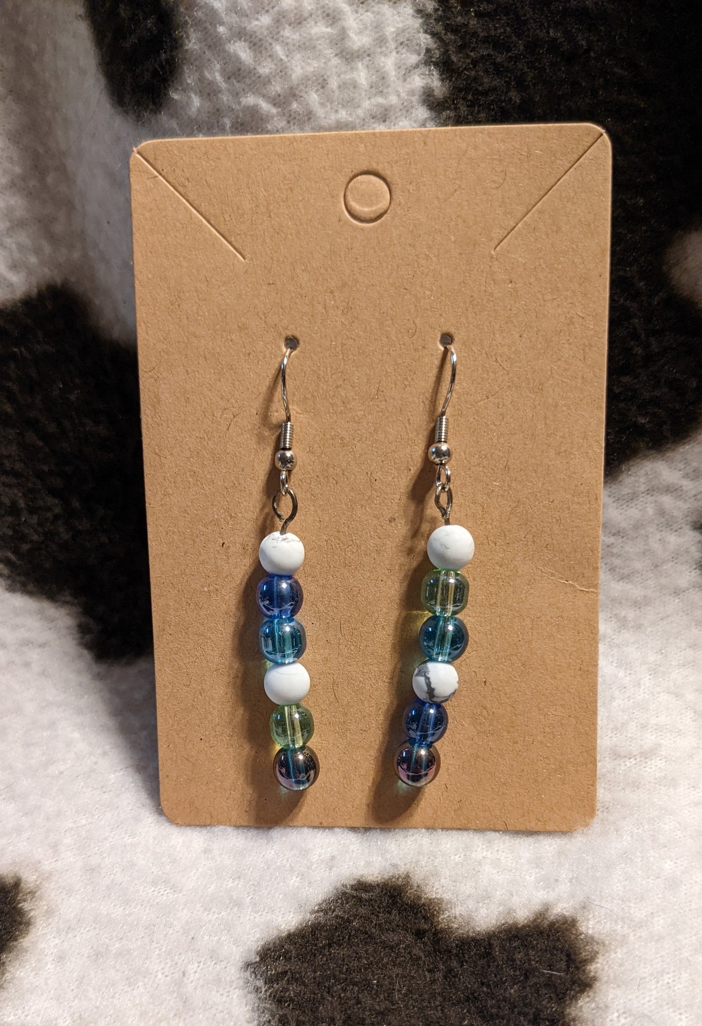 White blue and green dangling earrings