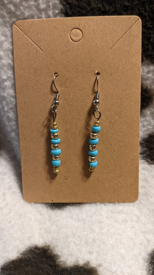Blue and gold dangling earring