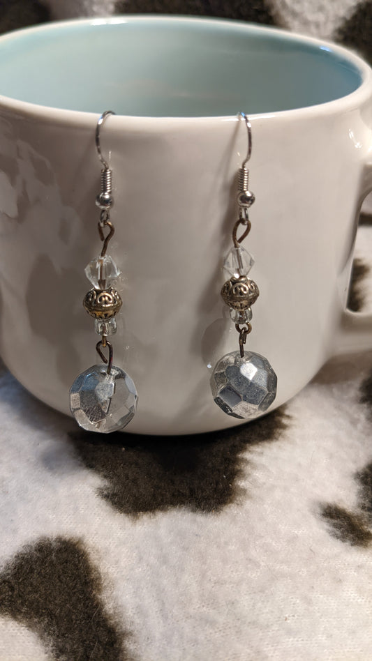 Silver and gold dangling earrings