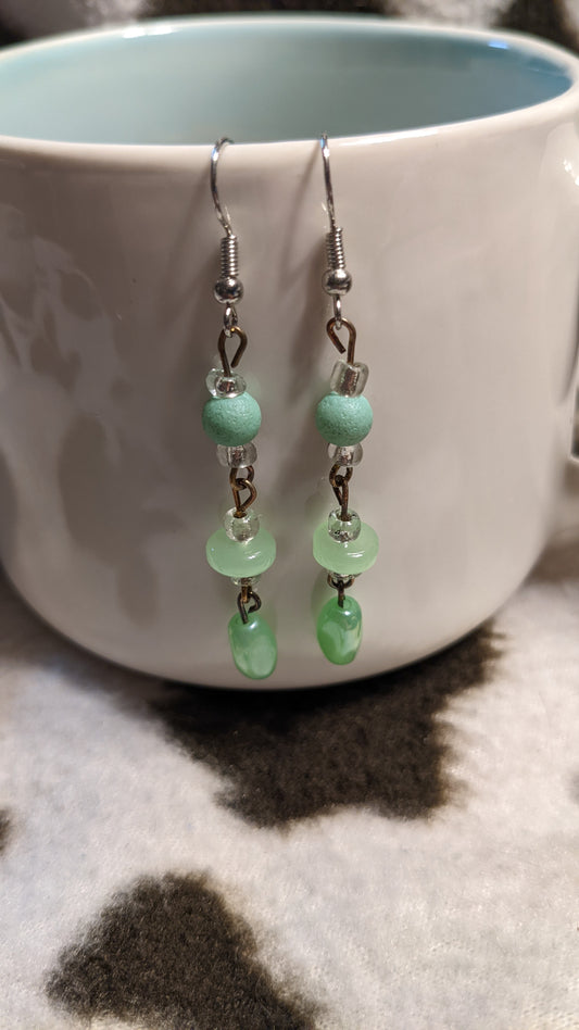 Green dangling earrings
