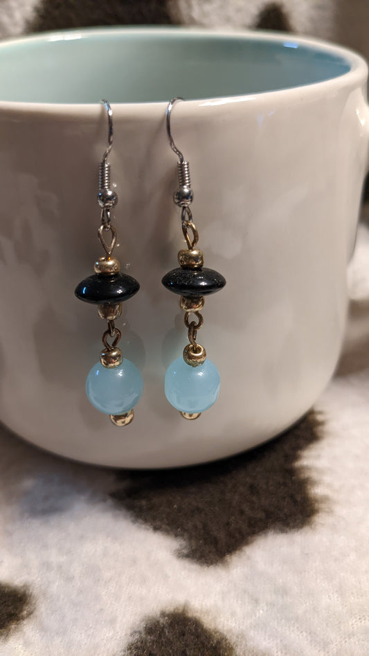 Light blue and black dangling earrings