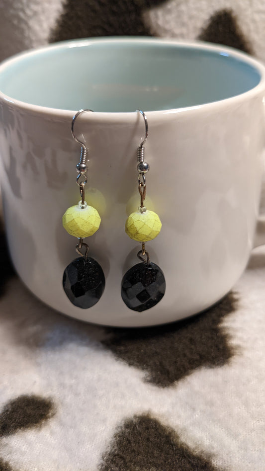 Yellow and black dangling earrings