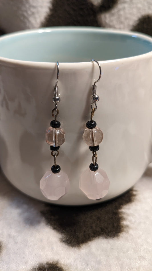 Pink and black dangling earrings